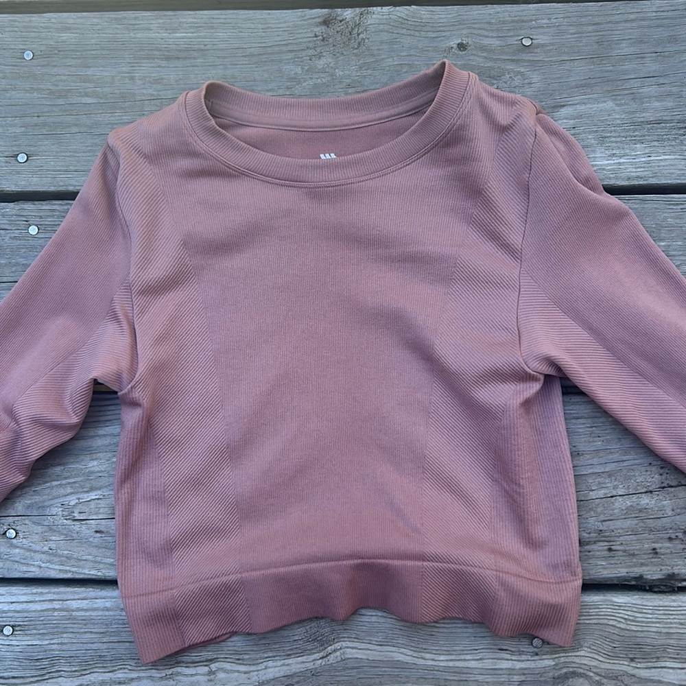 Tight light pink workout top